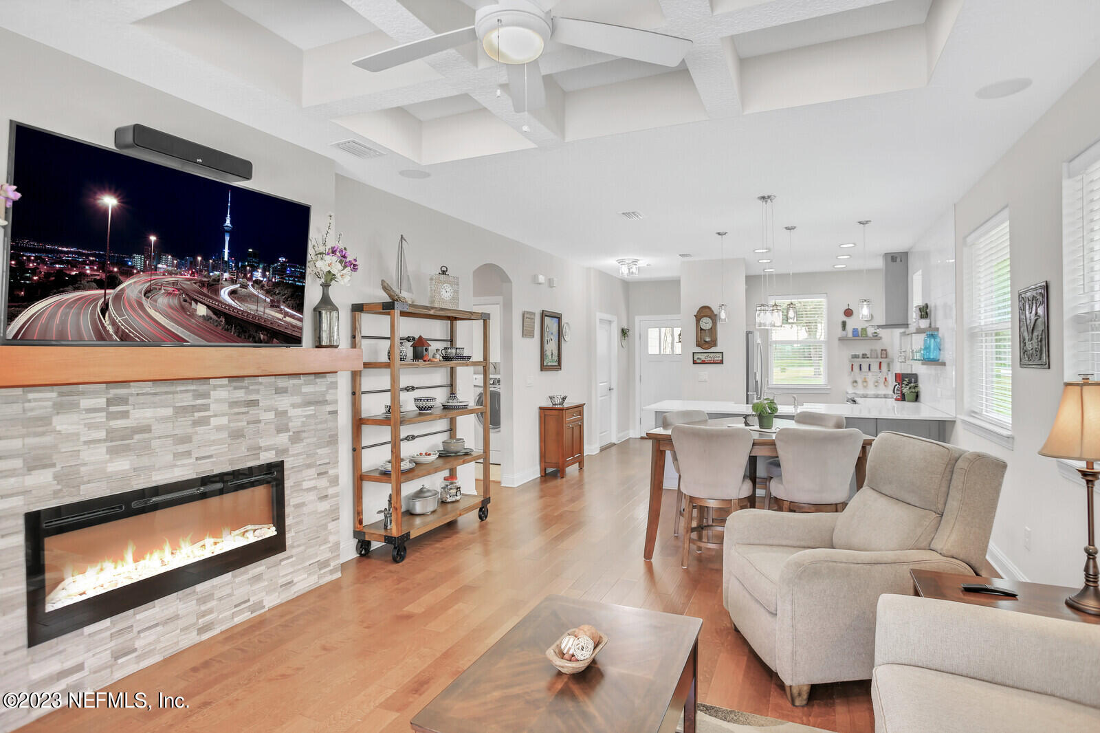 1521 Lee Road St. Johns, FL 32259 - Photo 6 of 38 a living room with furniture a fireplace and a flat screen tv