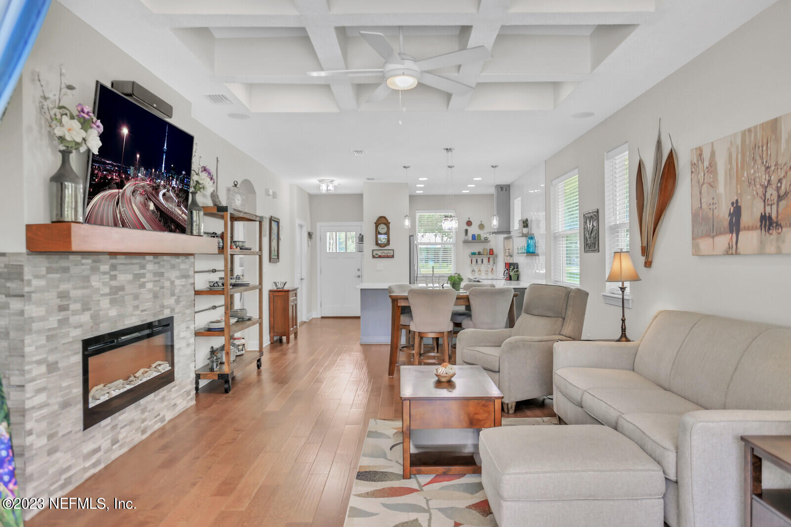 1521 Lee Road St. Johns, FL 32259 - Photo 10 of 38 a living room with furniture a fireplace and a flat screen tv