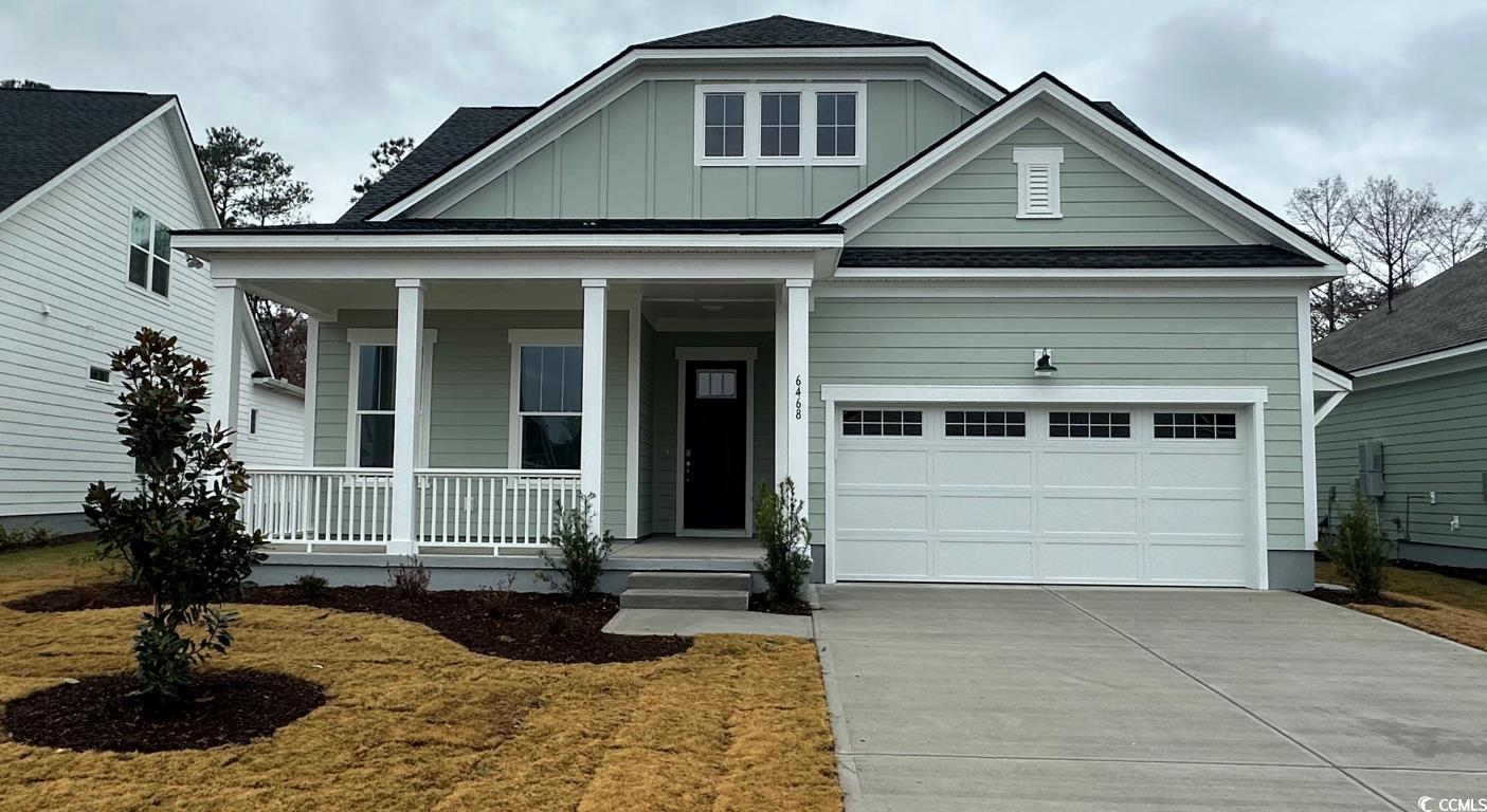 6468 Berg Street Murrells Inlet, SC 29576 - Photo 1 of 2 Craftsman-style house with a garage and covered po