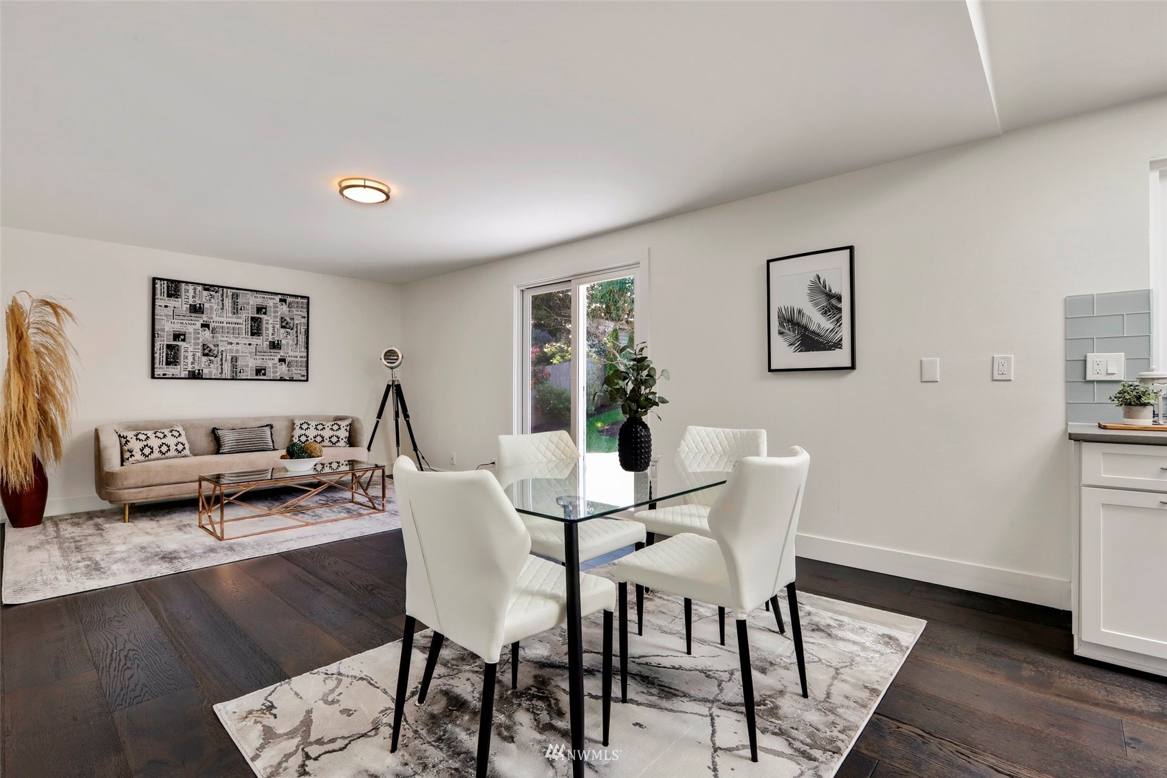 1808 243rd Place Southeast Bothell, WA 98021 - Photo 12 of 32 a view of a dining room with furniture and wooden floor