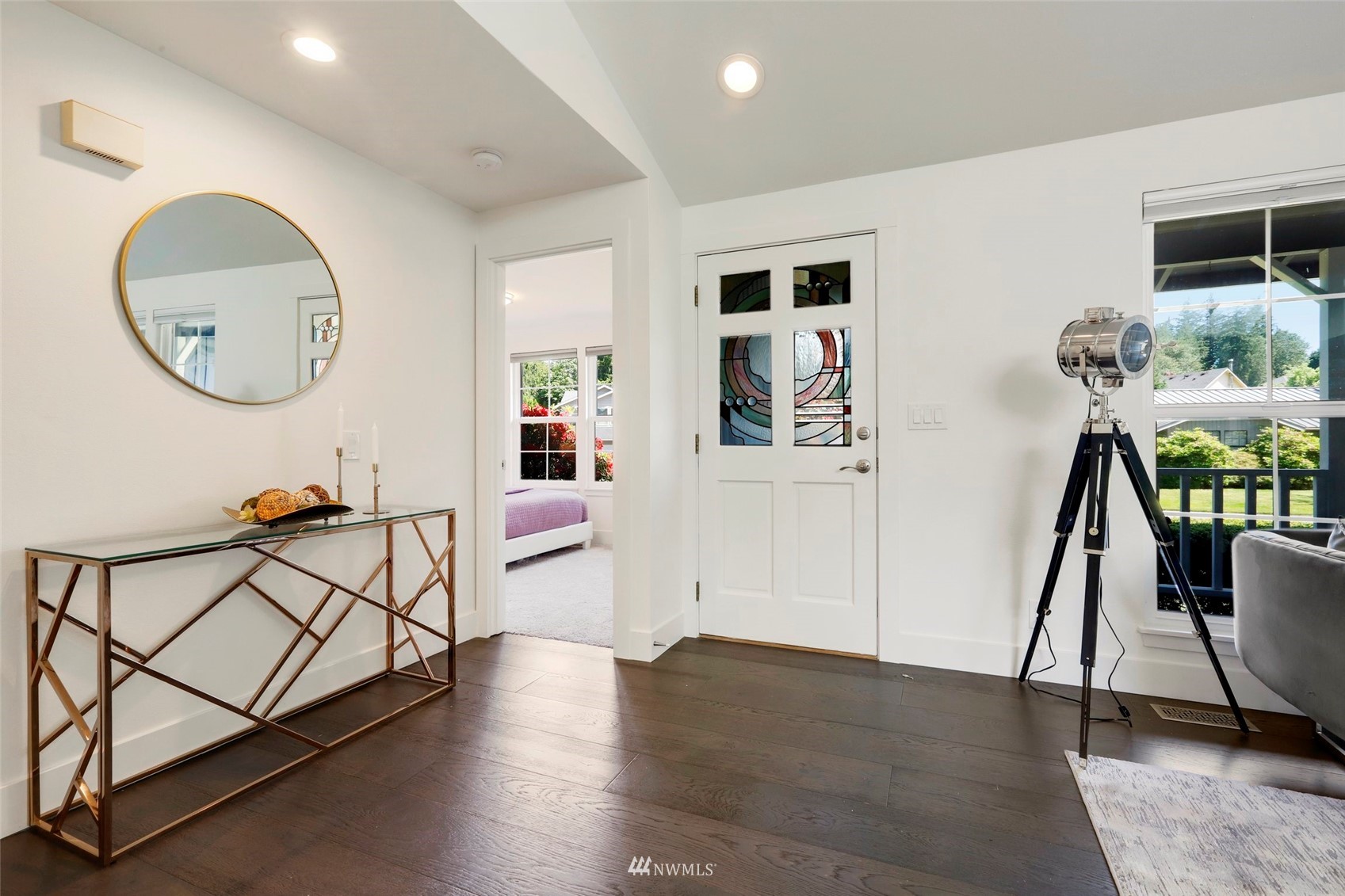 1808 243rd Place Southeast Bothell, WA 98021 - Photo 15 of 32 a view of a livingroom with furniture and a floor to ceiling window