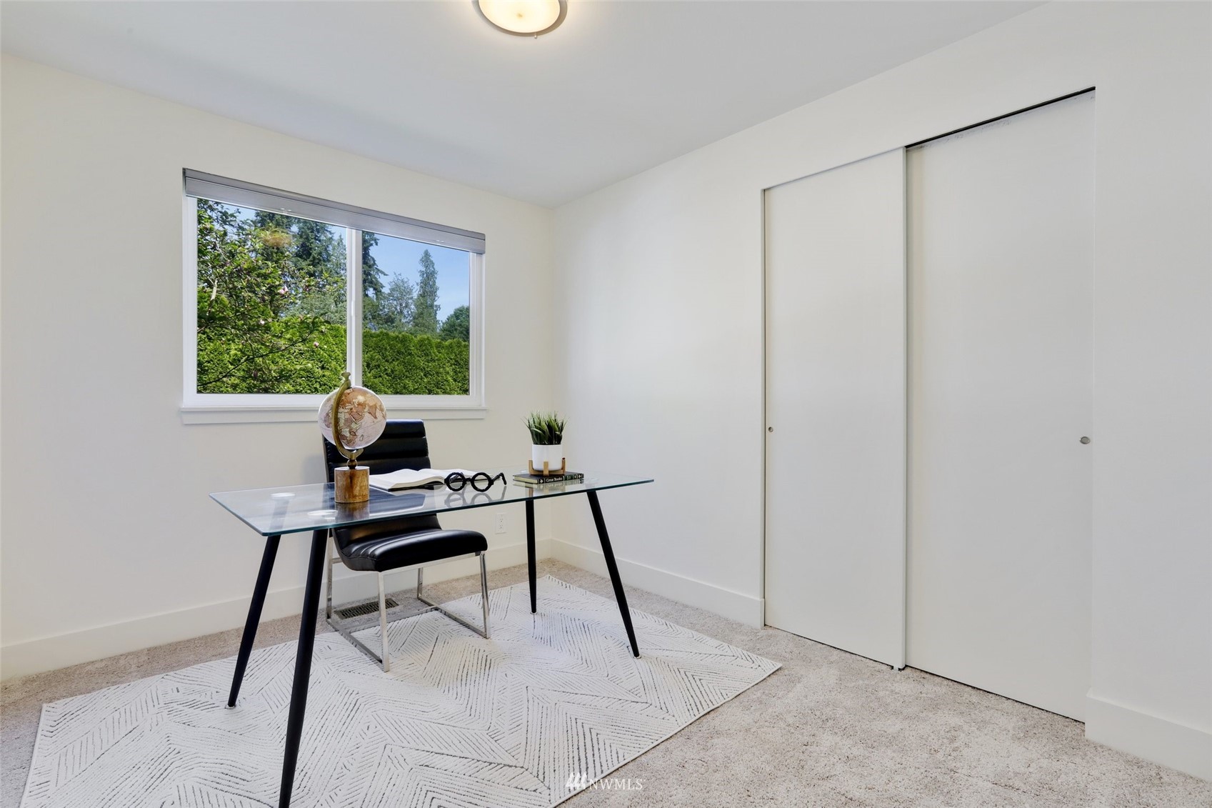 1808 243rd Place Southeast Bothell, WA 98021 - Photo 17 of 32 a workspace with furniture and a window