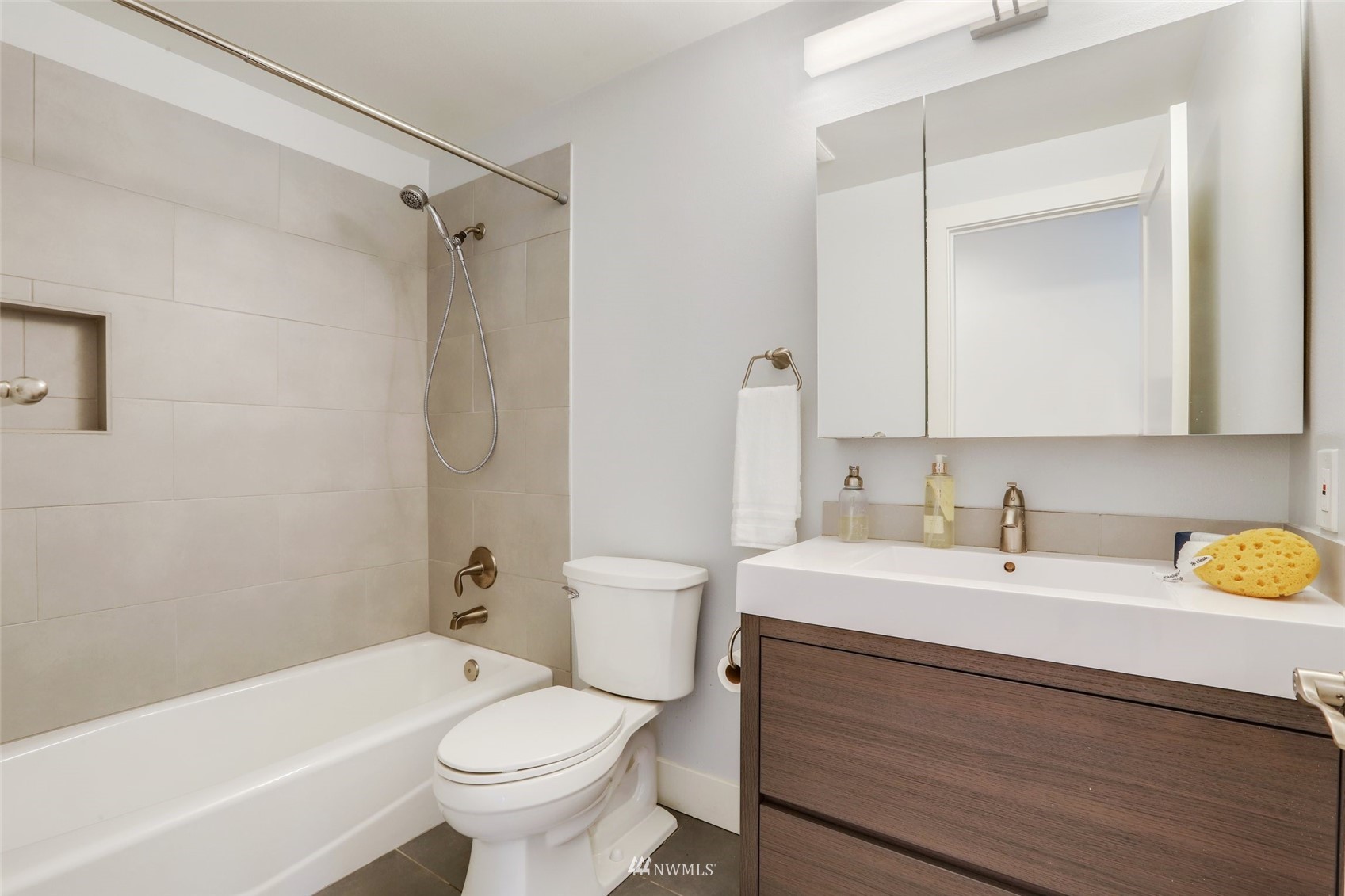 1808 243rd Place Southeast Bothell, WA 98021 - Photo 18 of 32 a bathroom with a sink a toilet and a bathtub