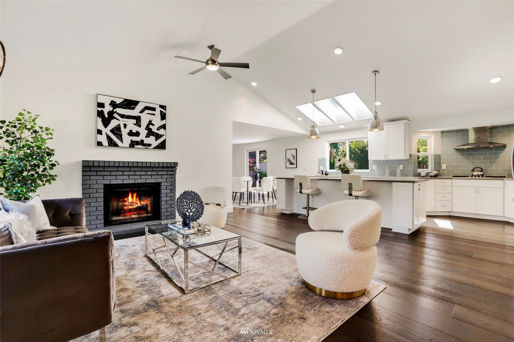 1808 243rd Place Southeast Bothell, WA 98021 - Photo 5 of 32 a living room with furniture and a fireplace