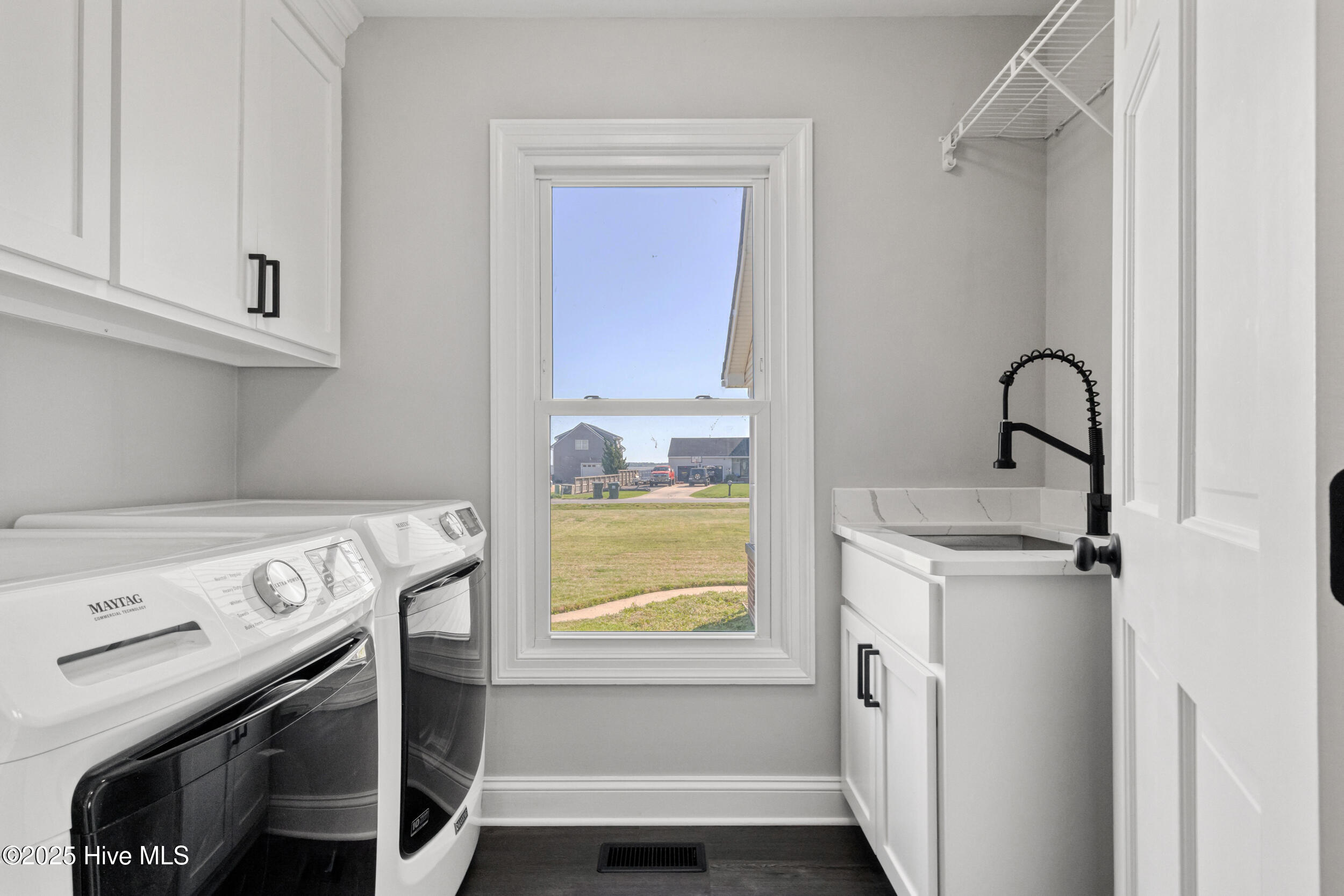 169 Baxter Estates Road Currituck, NC 27929 - Photo 18 of 39 Laundry room. Washer & dryer convey