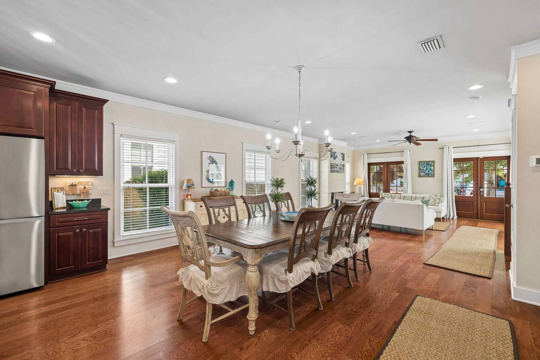 39 Willow Mist Road Inlet Beach, FL 32461 - Photo 9 of 41 a dining room with furniture a chandelier and wooden floor
