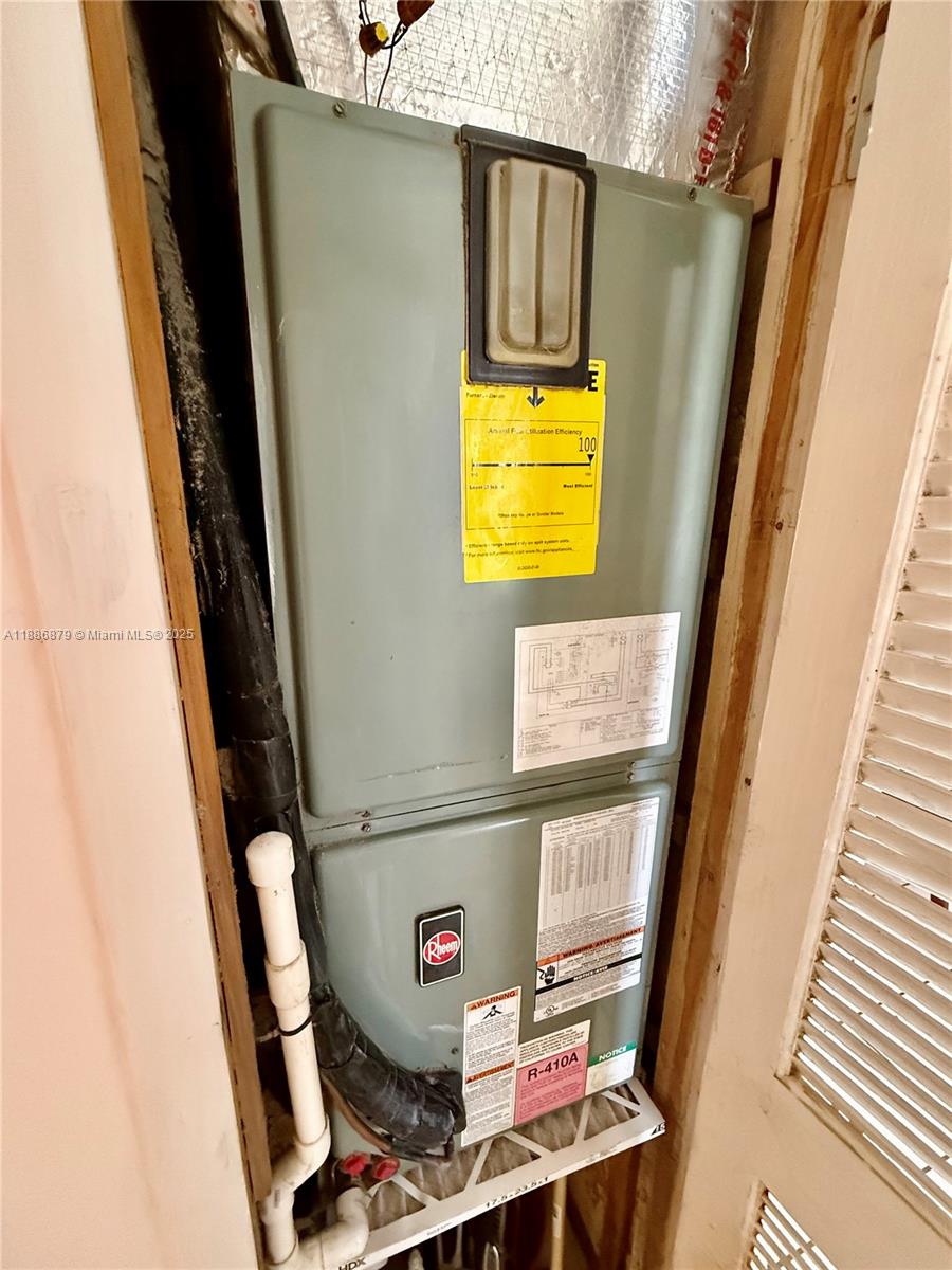 3310 Southwest 94th Place Miami, FL 33165 - Photo 18 of 24 a bathroom with a sink and a mirror