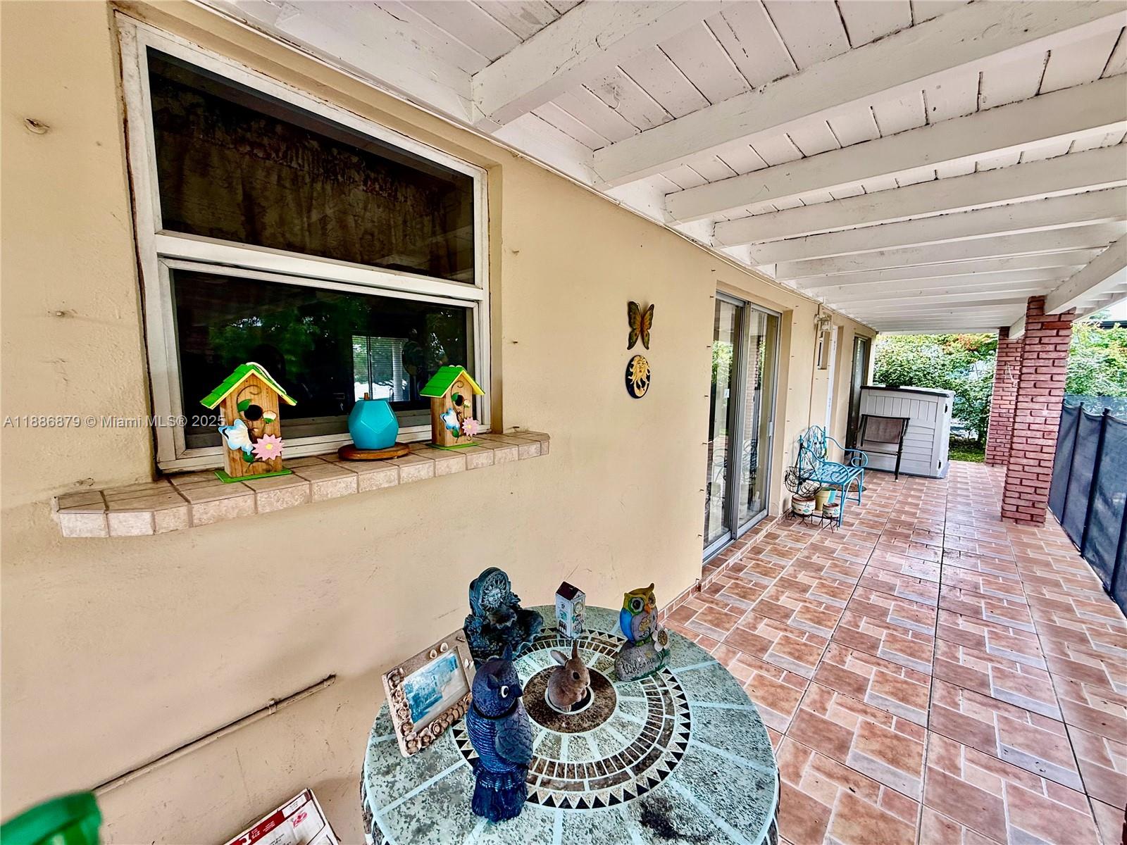 3310 Southwest 94th Place Miami, FL 33165 - Photo 19 of 24 a bedroom with furniture and a bed