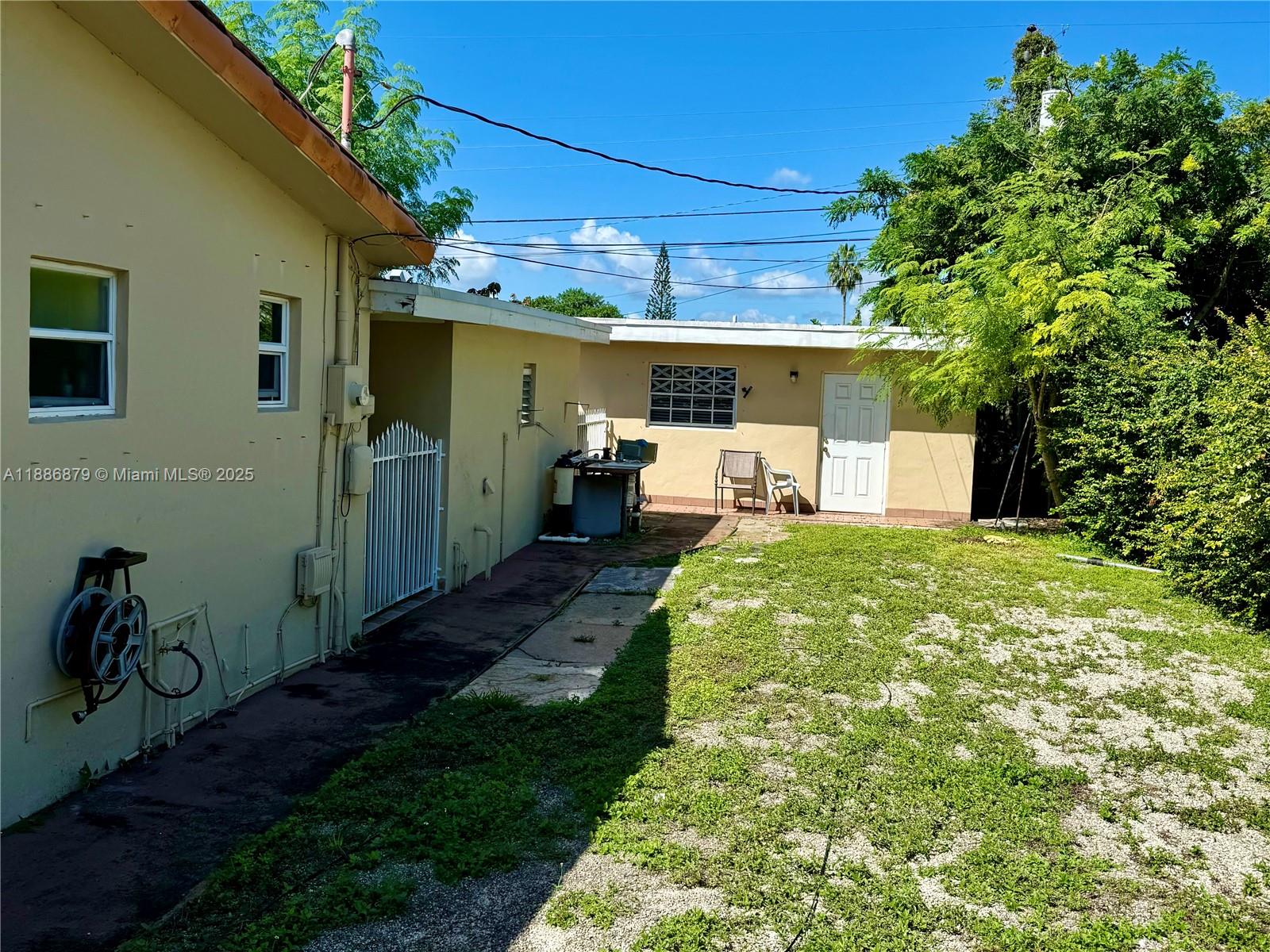 3310 Southwest 94th Place Miami, FL 33165 - Photo 24 of 24 a front view of a house with garden