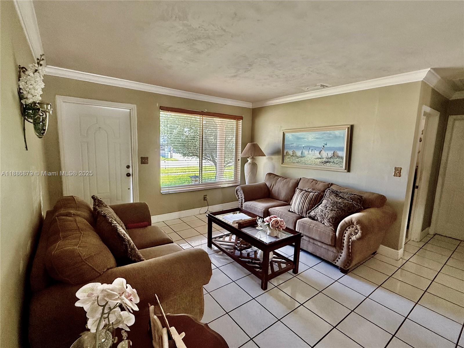 3310 Southwest 94th Place Miami, FL 33165 - Photo 9 of 24 a living room with furniture and wooden floor
