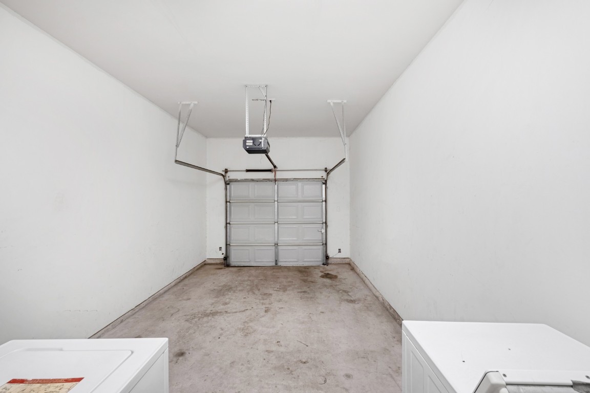 2906 Pearl Street, Unit C Austin, TX 78705 - Photo 10 of 25 Garage with a garage door opener