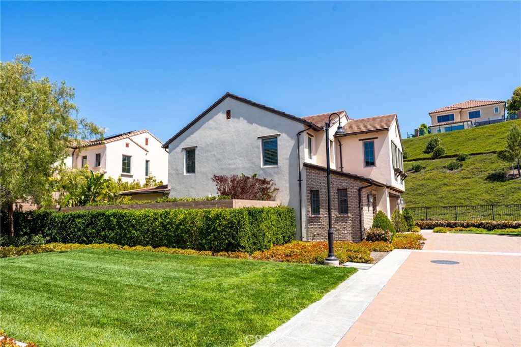 218 Oceano Irvine, CA 92602 - Photo 13 of 56 a front view of a house with a yard