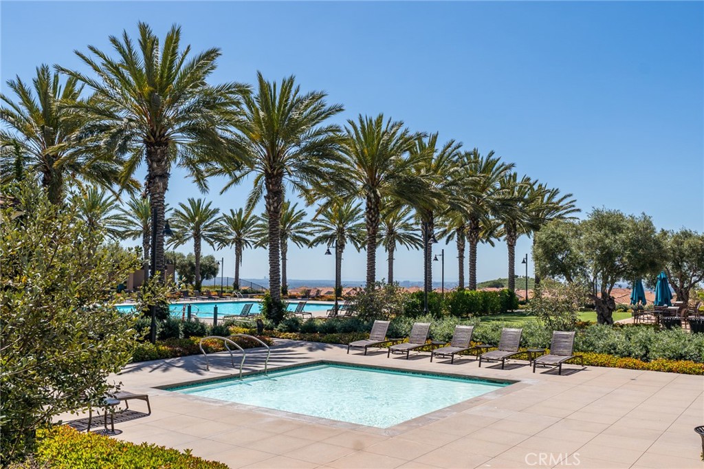 218 Oceano Irvine, CA 92602 - Photo 17 of 56 a view of a swimming pool with chairs in patio