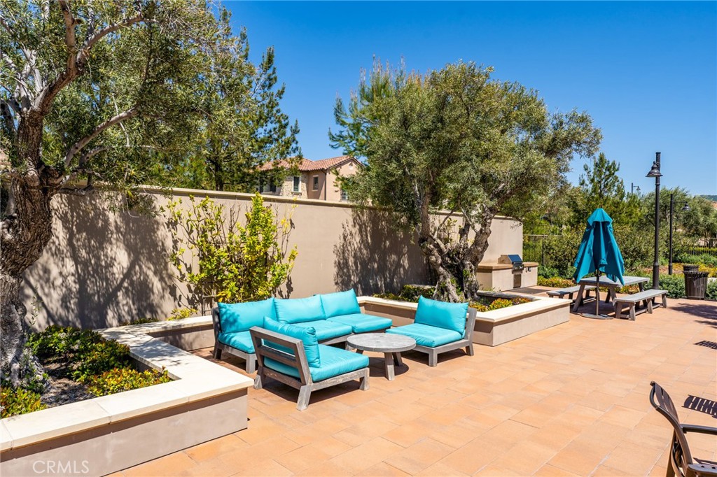 218 Oceano Irvine, CA 92602 - Photo 22 of 56 a backyard of a house with table and chairs