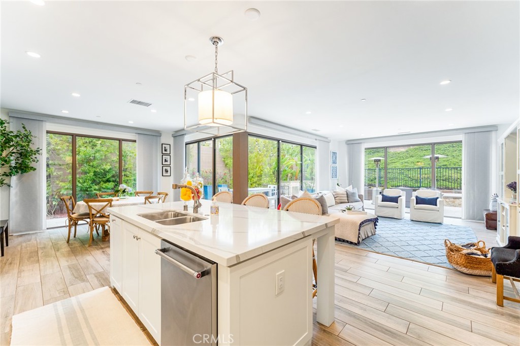 218 Oceano Irvine, CA 92602 - Photo 33 of 56 a very nice looking living room with a large window and dining table