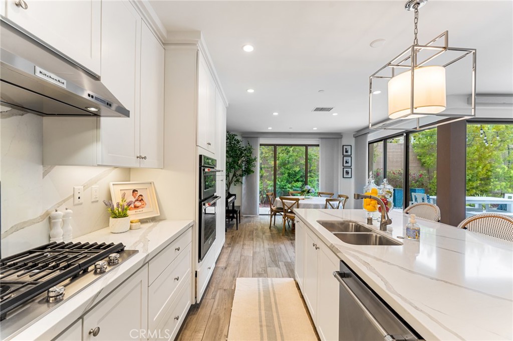 218 Oceano Irvine, CA 92602 - Photo 34 of 56 a kitchen with stainless steel appliances a stove a sink a refrigerator and window