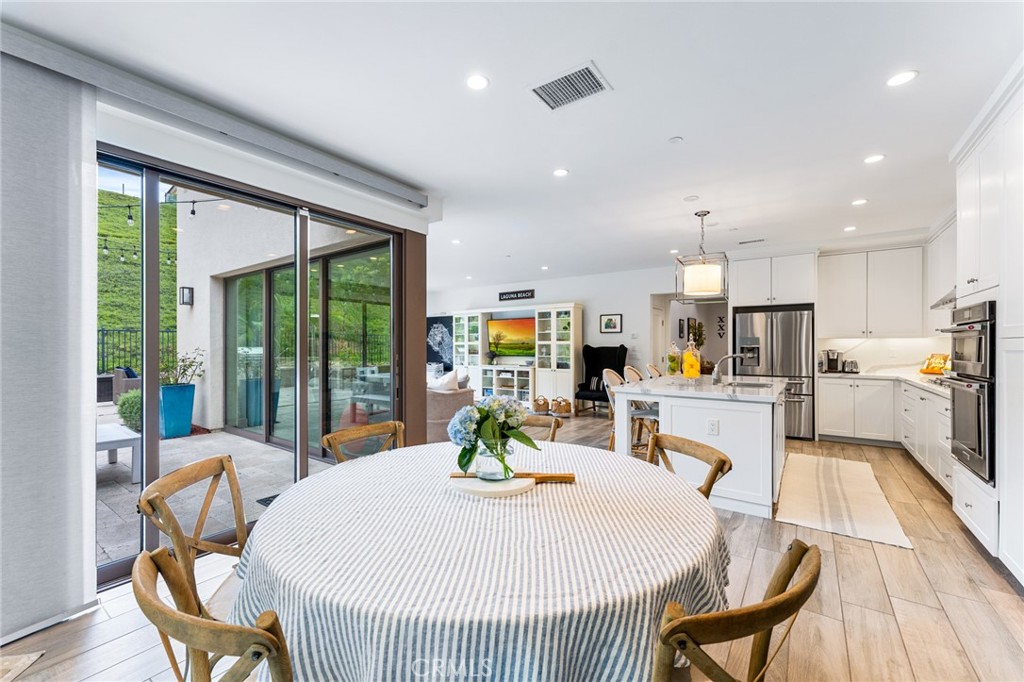 218 Oceano Irvine, CA 92602 - Photo 40 of 56 a view of a dining room with furniture window and outside view