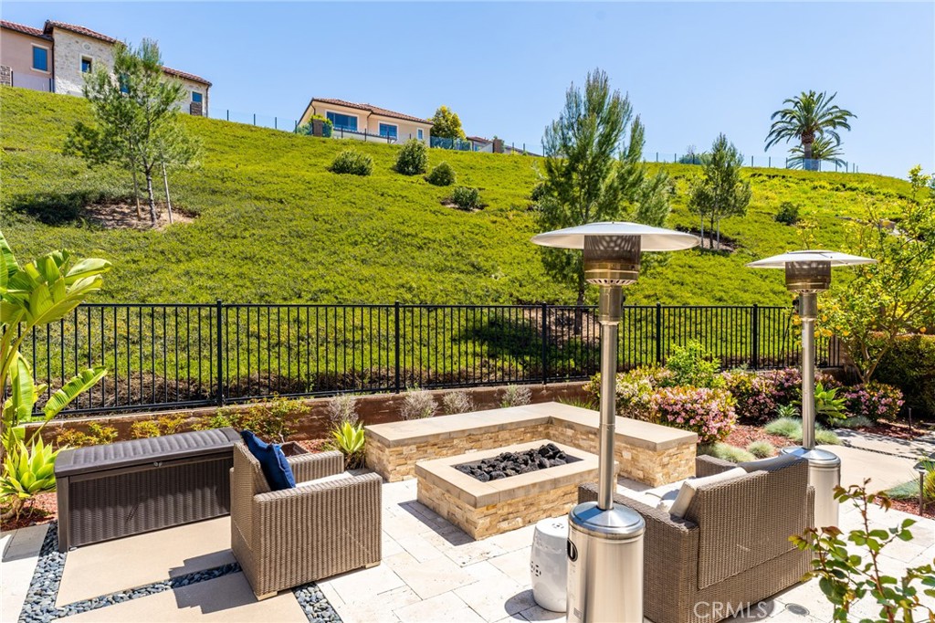 218 Oceano Irvine, CA 92602 - Photo 4 of 56 a view of a chairs and table in the patio