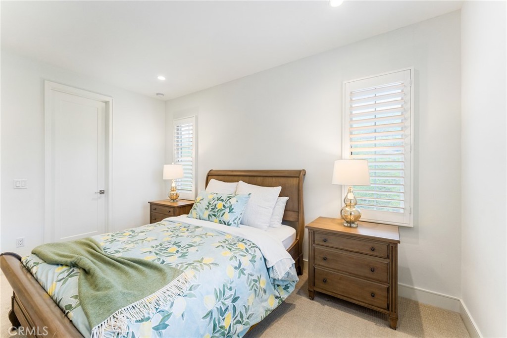 218 Oceano Irvine, CA 92602 - Photo 48 of 56 a bedroom with a bed and a window