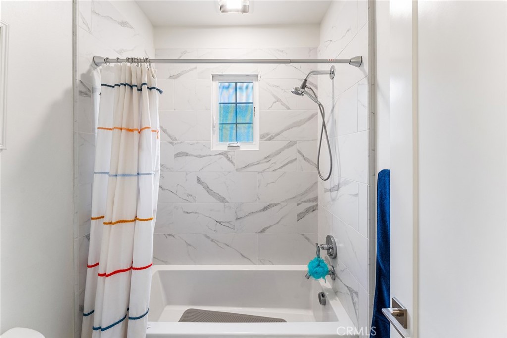 218 Oceano Irvine, CA 92602 - Photo 50 of 56 a bathroom with a shower and a shower