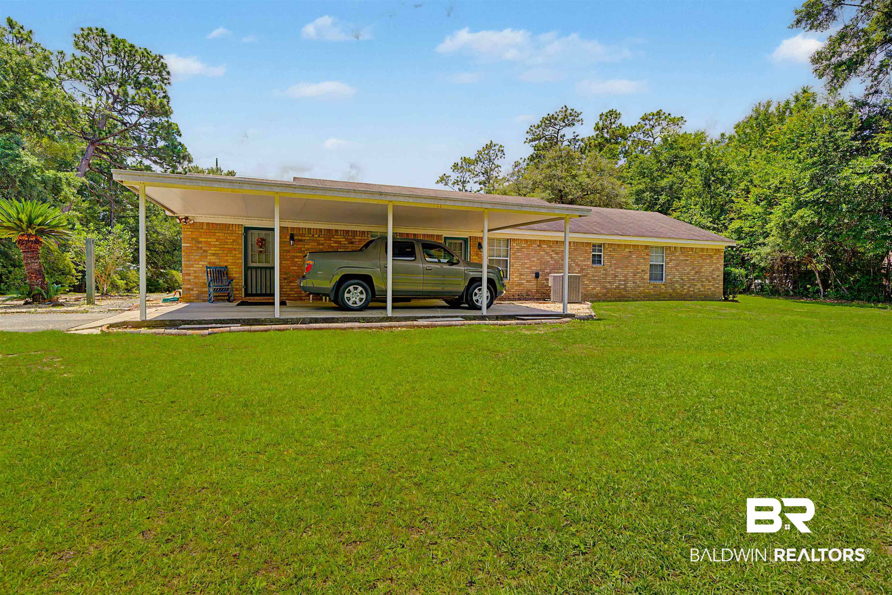 22963 Highway 98 Foley, AL 36535 - Photo 6 of 52 Expansive green lawn providing abundant outdoor space
