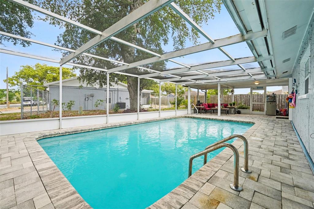 11828 Bingham Drive Port Richey, FL 34668 - Photo 27 of 32 a view of a swimming pool