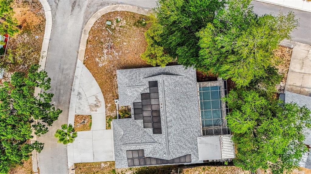 11828 Bingham Drive Port Richey, FL 34668 - Photo 31 of 32 an aerial view of a house with a yard