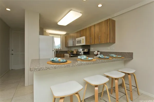 a bedroom with a bed and a view of bathroom