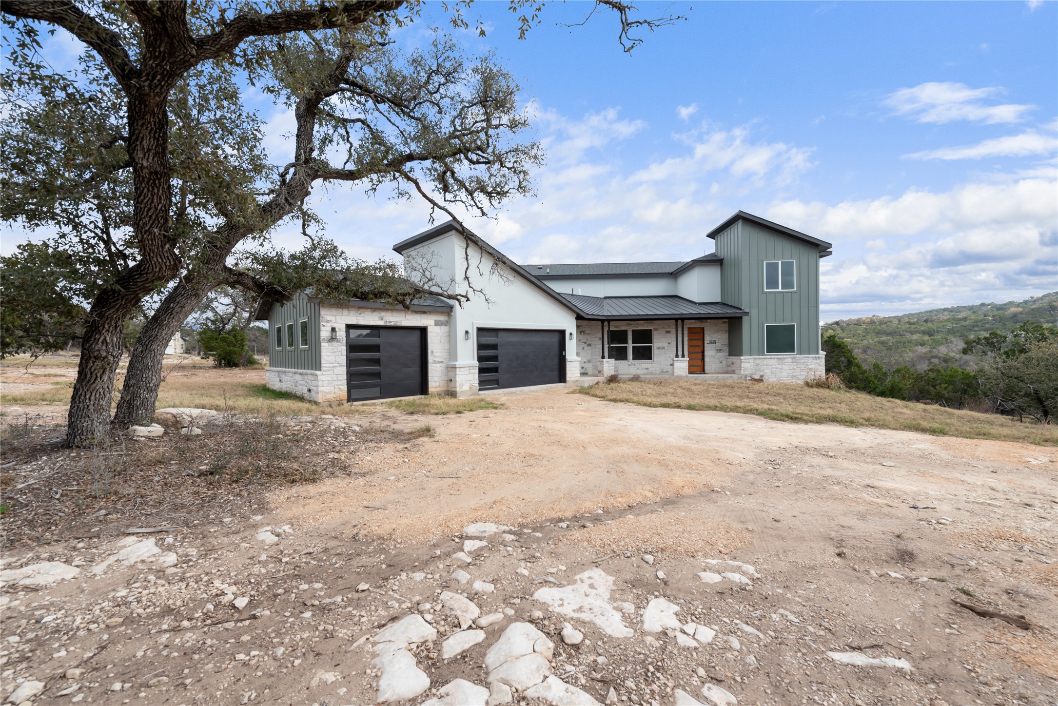 18213 Gregg Bluff Road Jonestown, TX 78645 - Photo 2 of 40