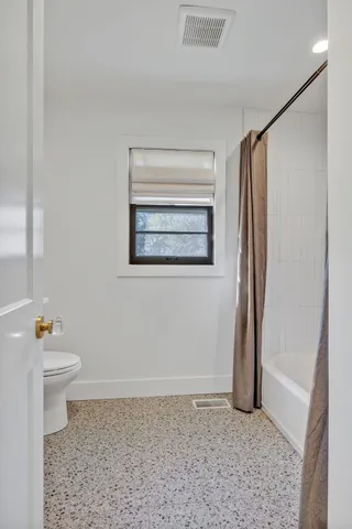 a bathroom with a sink and a toilet