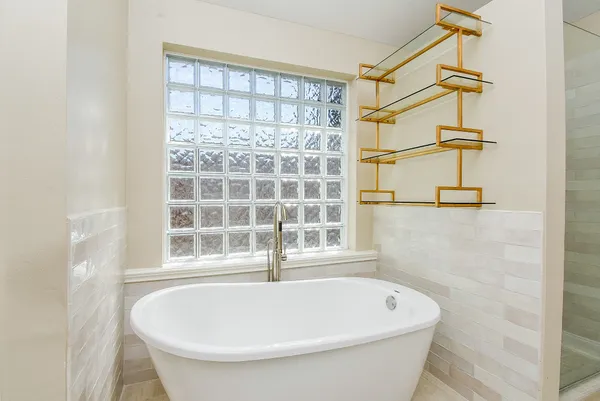 a bathroom with a bathtub