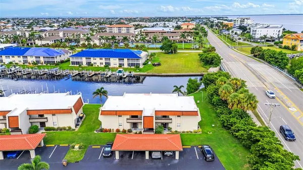 an aerial view of residential houses and outdoor space