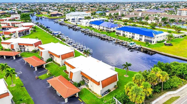 an aerial view of a house with a garden