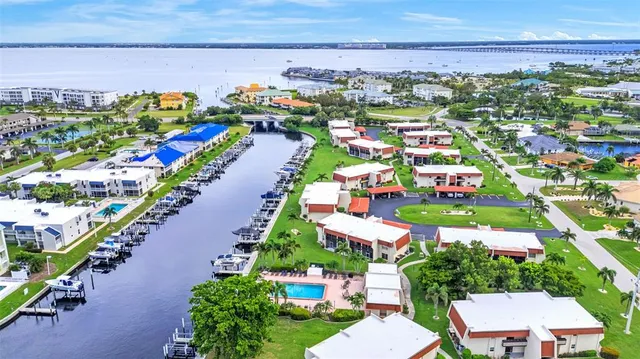 a view of a chairs and table in a yard