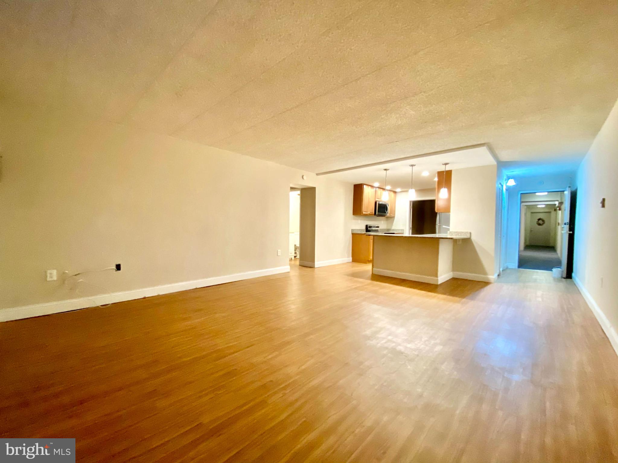 400 Glendale Road Havertown, PA 19083 - Photo 14 of 24 a view of a livingroom with wooden floor and a sink