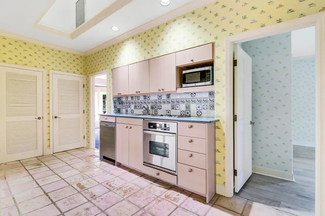 a bathroom with a sink a vanity and a mirror