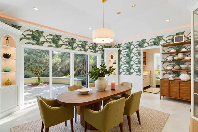 a view of a dining room with furniture window and outside view