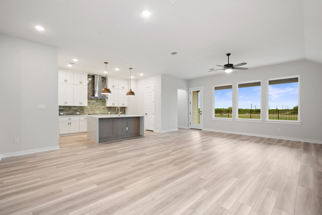 16201 Smithers Road Manor, TX 78653 - Photo 15 of 40 a view of a kitchen with a sink and a large window
