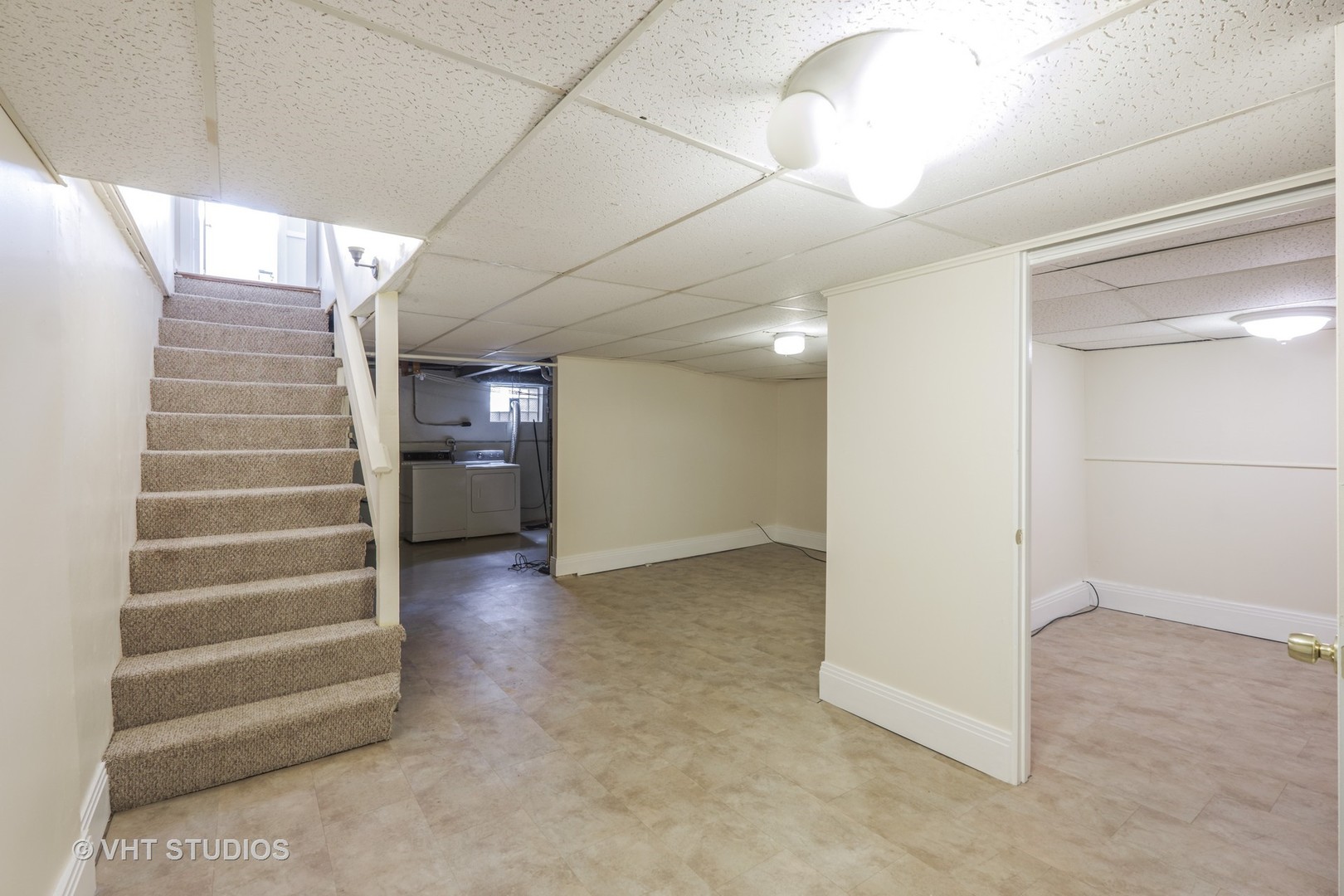 314 Skokie Road Wilmette, IL 60091 - Photo 11 of 14 a view of an empty room with stairs and a ceiling fan