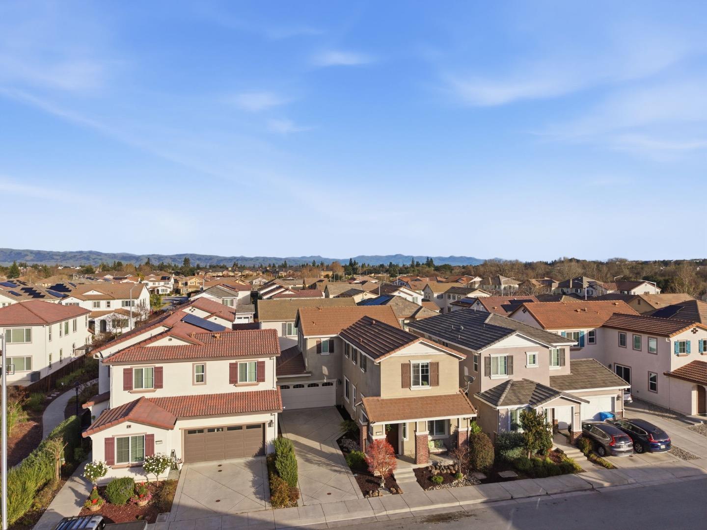 7716 Oregano Way Gilroy, CA 95020 - Photo 30 of 34 an aerial view of residential houses and city street