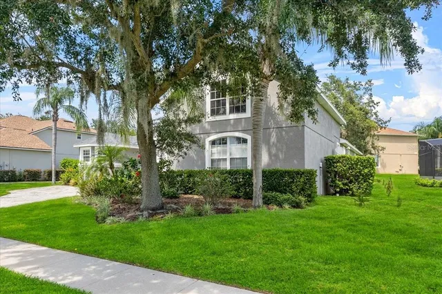 an aerial view of a house with a garden