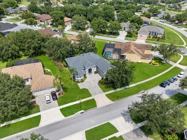 a view of a golf course with a swimming pool