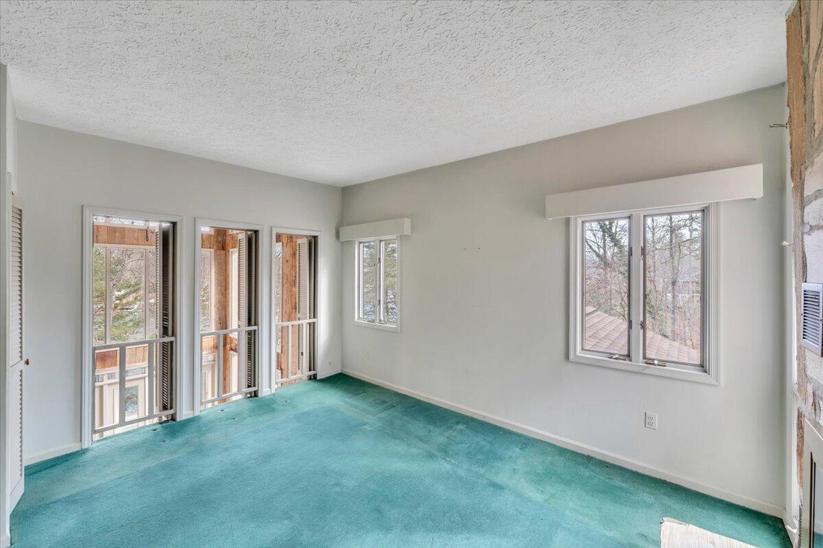 2768 Lake Retreat Road Huddleston, VA 24104 - Photo 39 of 92 a view of empty room with windows