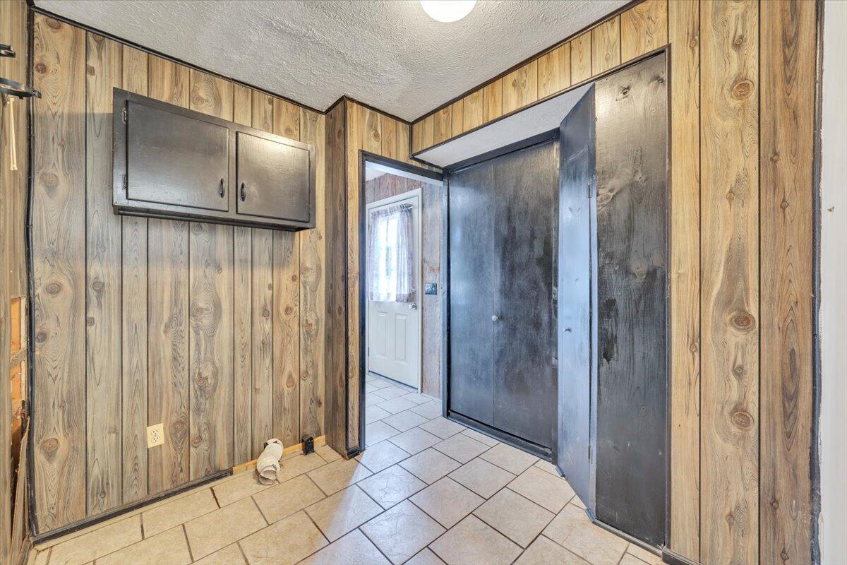 2768 Lake Retreat Road Huddleston, VA 24104 - Photo 49 of 92 a bathroom with a glass shower door and a sink