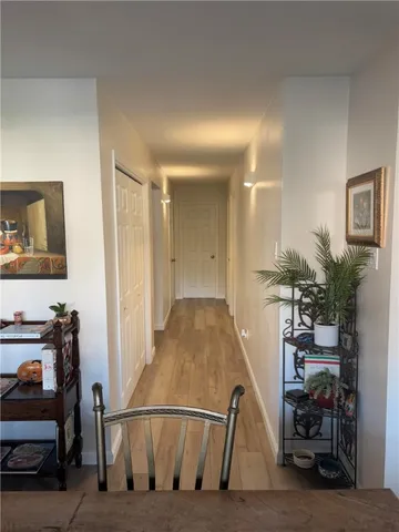 a view of a hallway with workspace