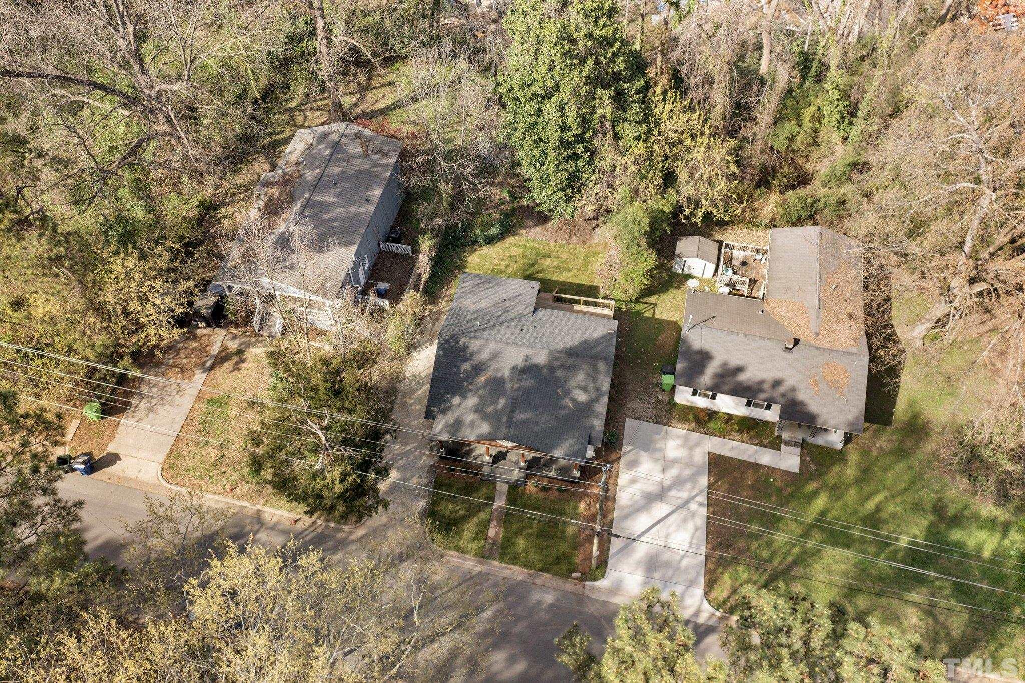 2908 Woods Place Raleigh, NC 27607 - Photo 16 of 38 an aerial view of residential house with outdoor space