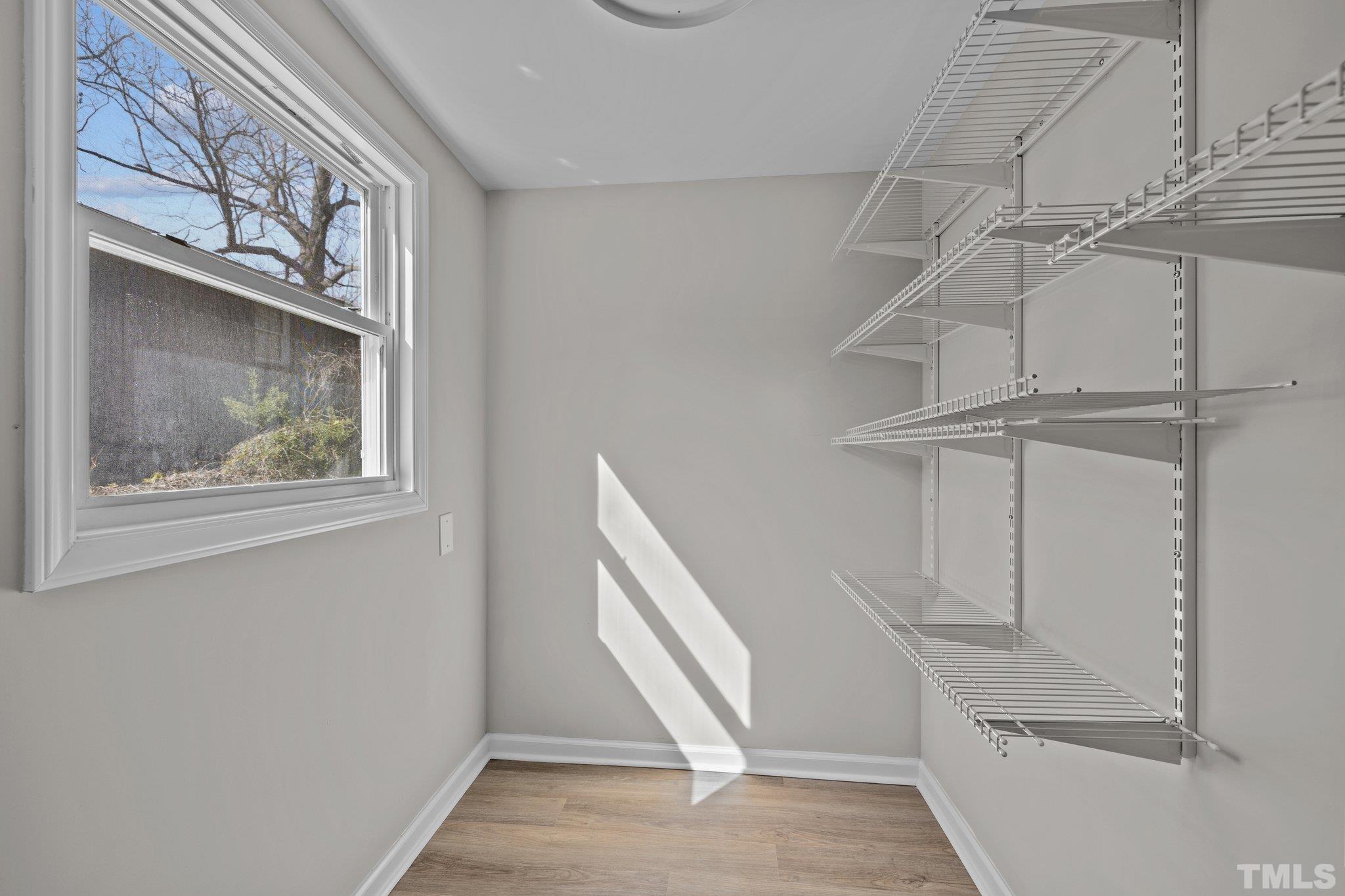 2908 Woods Place Raleigh, NC 27607 - Photo 32 of 38 a view of an entryway with staircase