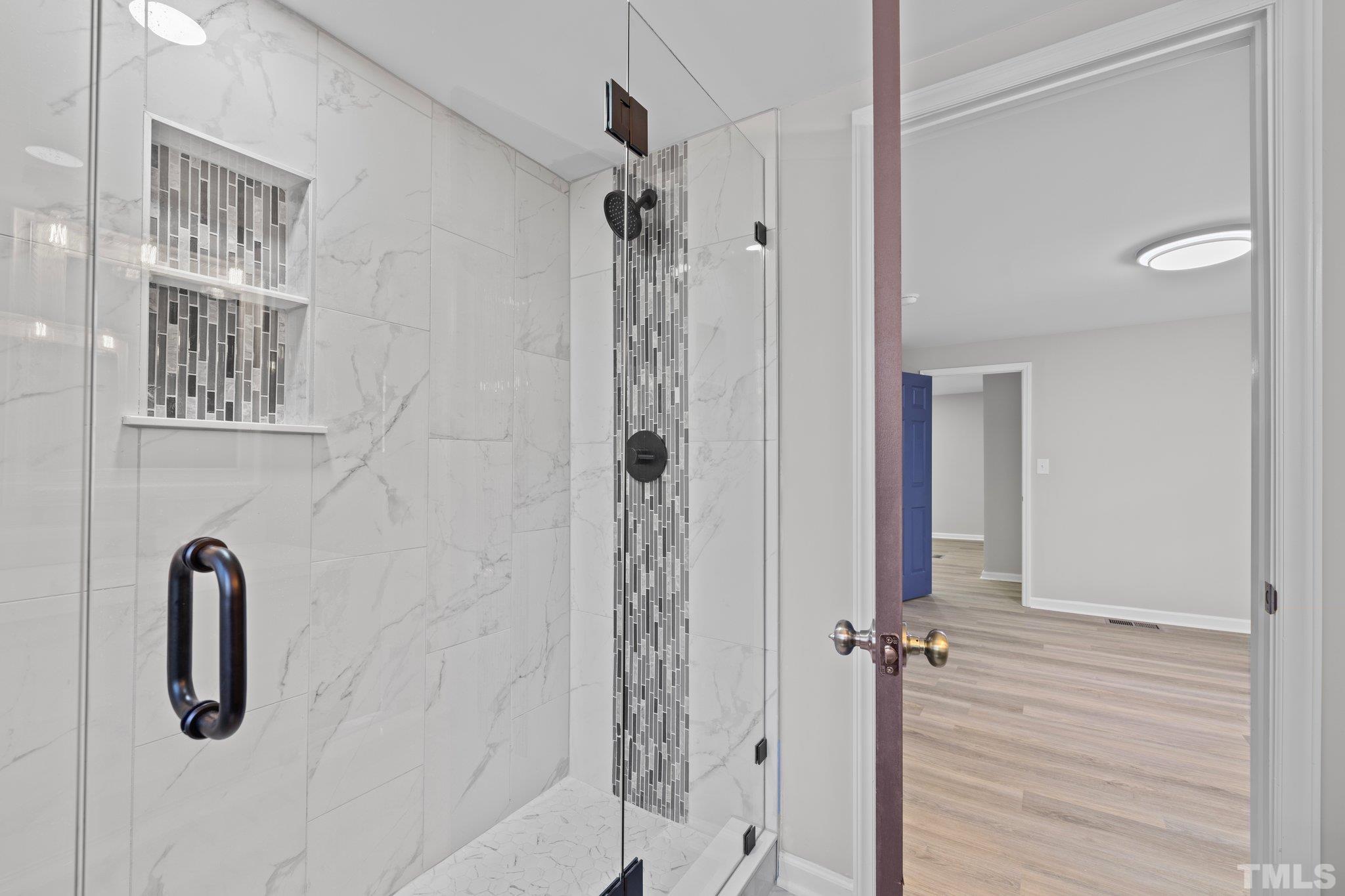 2908 Woods Place Raleigh, NC 27607 - Photo 35 of 38 a bathroom with a shower