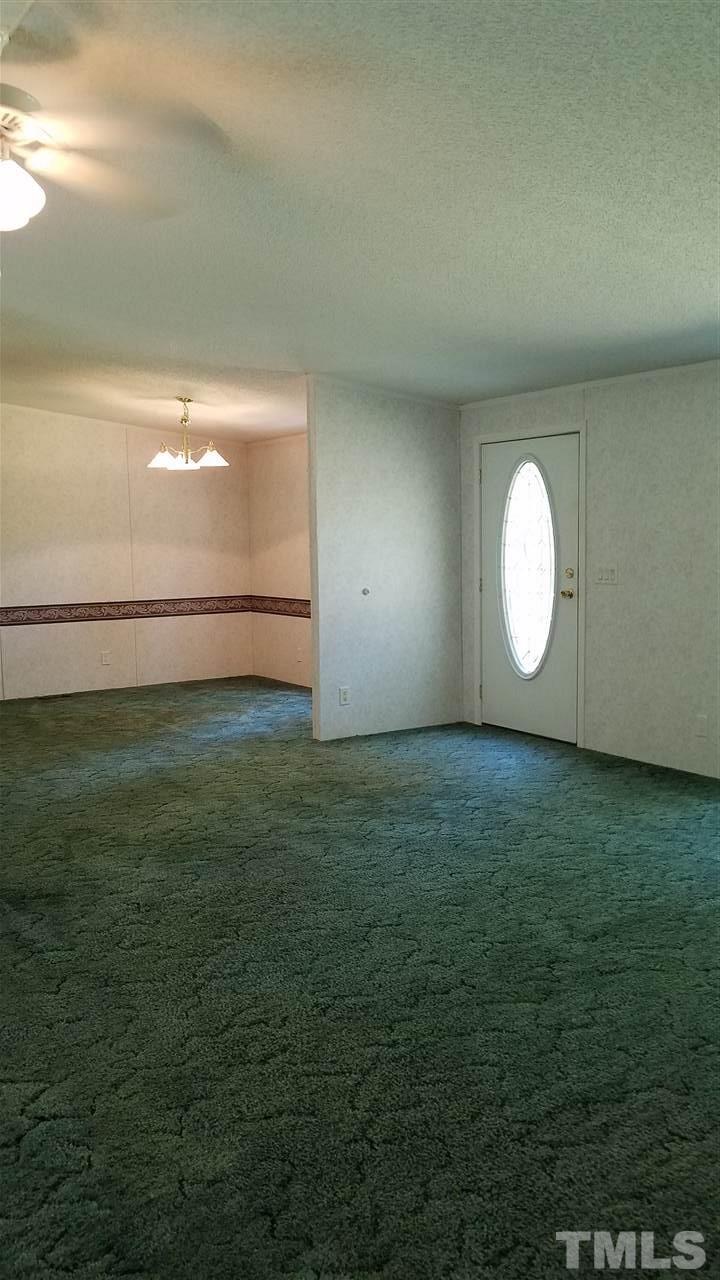 301 Fox Ridge Road Louisburg, NC 27549 - Photo 3 of 6 Great room looking at separate dining rm