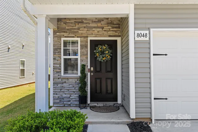 a front view of a house with a shower